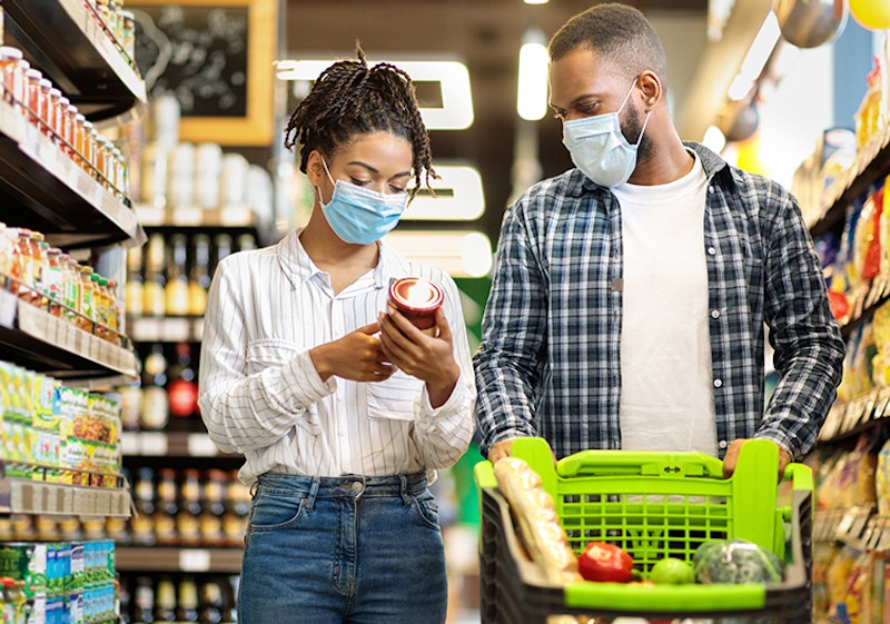 Masked Couple Grocery Shopping